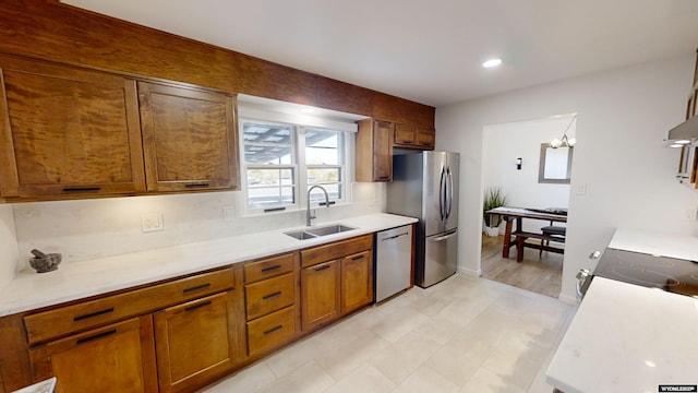 kitchen featuring appliances with stainless steel finishes and sink