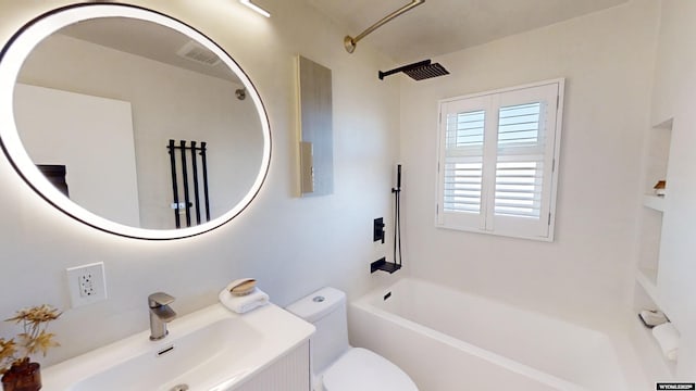 full bathroom featuring bathtub / shower combination, vanity, and toilet