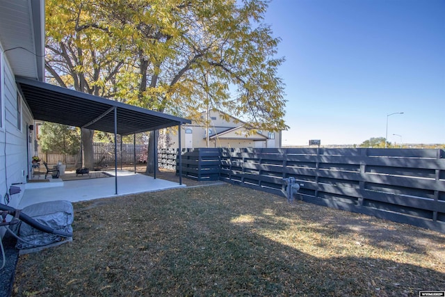 view of yard with a patio area