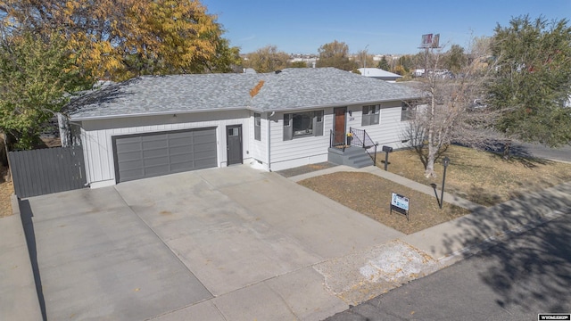 single story home with a garage