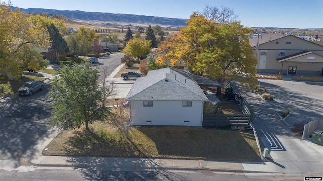 drone / aerial view featuring a mountain view