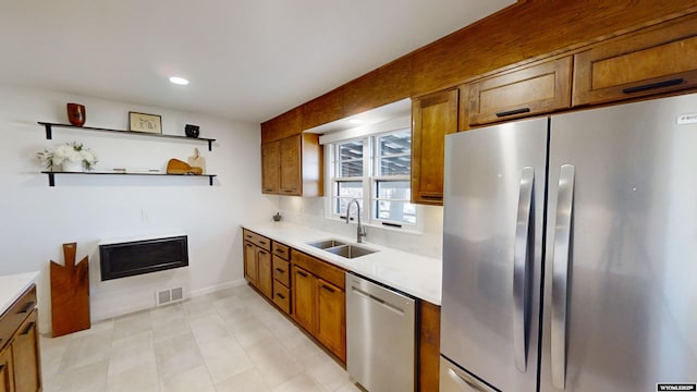 kitchen with appliances with stainless steel finishes and sink