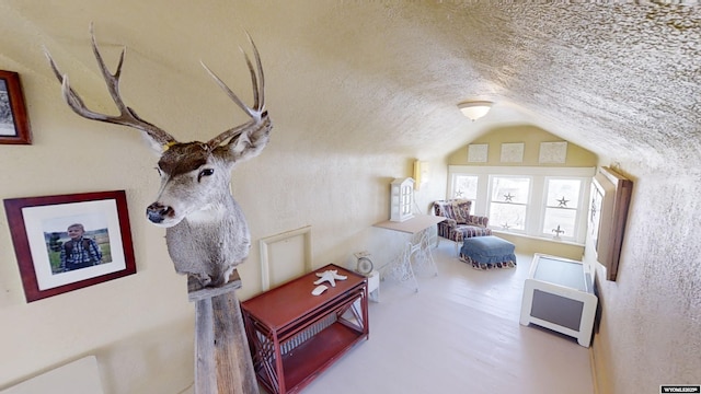 interior space with brick ceiling and lofted ceiling