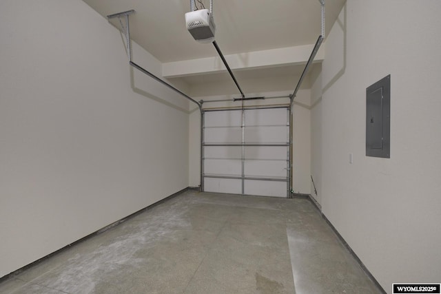 garage featuring a garage door opener and electric panel