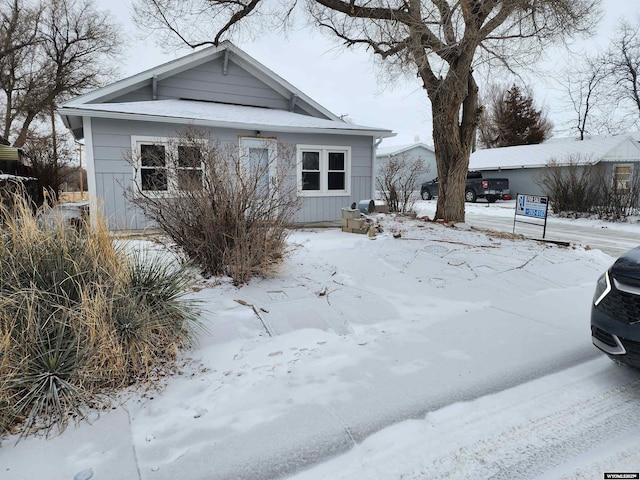 view of snow covered property