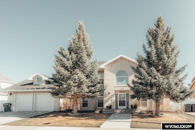 view of front of property featuring a garage