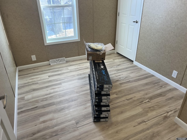 interior space with light hardwood / wood-style floors