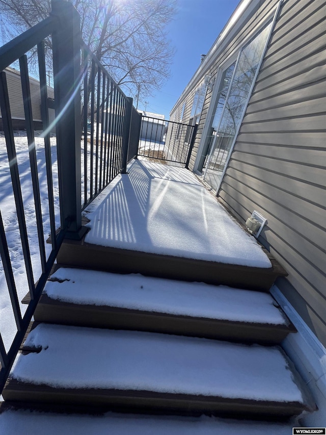 view of snow covered deck