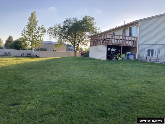 view of yard featuring a wooden deck