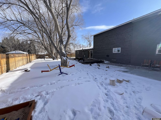 view of yard layered in snow