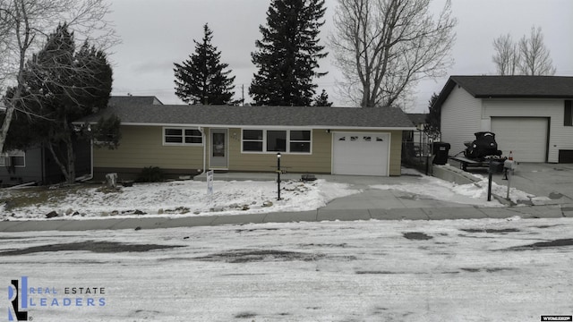 ranch-style house featuring a garage