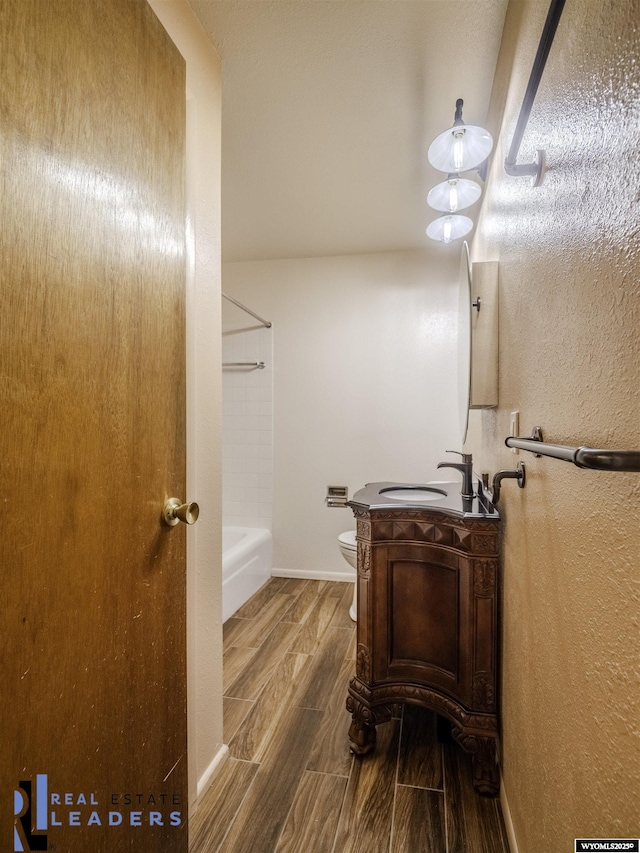 full bathroom with vanity, toilet, and bathing tub / shower combination