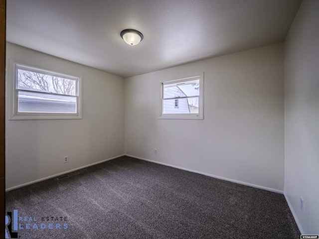 view of carpeted spare room