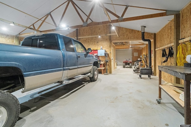 garage featuring wooden walls