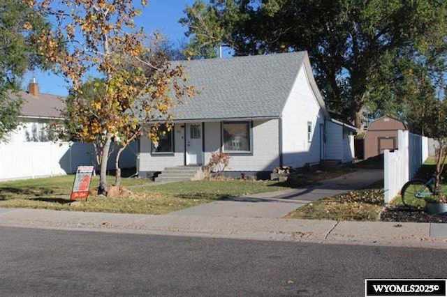 view of front facade with a shed