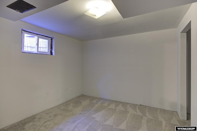 basement with light colored carpet