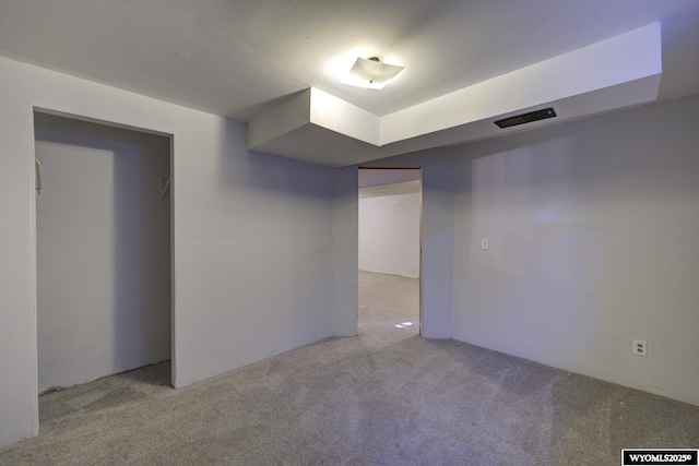 basement with light colored carpet