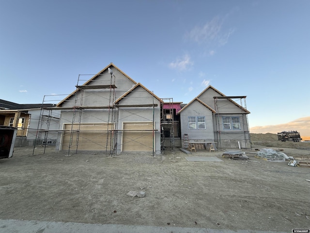 unfinished property featuring an outbuilding