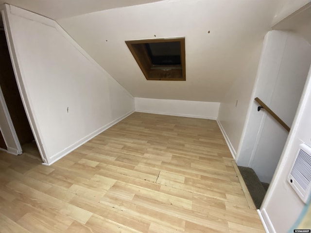 bonus room featuring light hardwood / wood-style floors