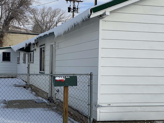 view of snow covered property