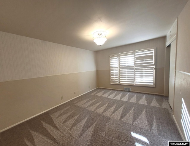 empty room with carpet floors