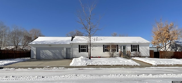 single story home featuring a garage