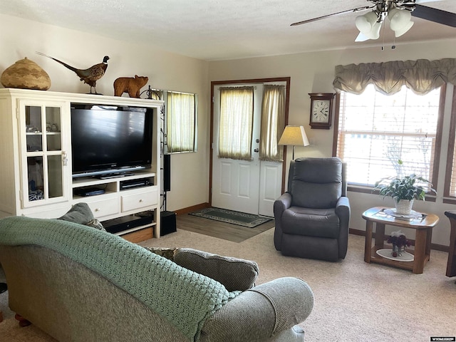 living room featuring ceiling fan