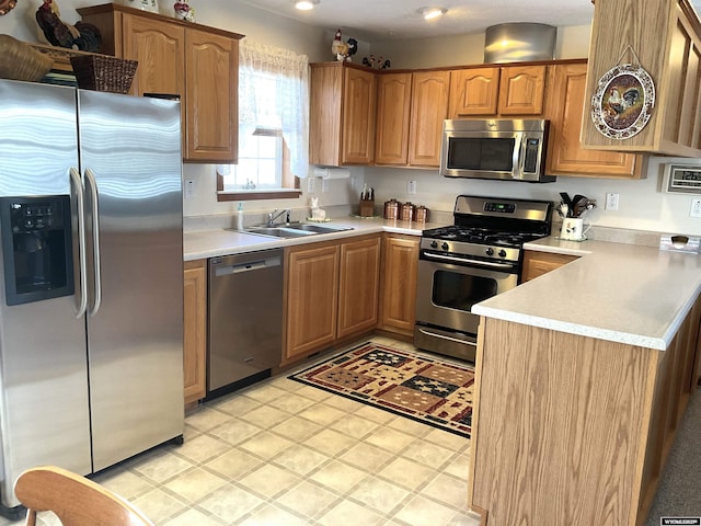 kitchen featuring appliances with stainless steel finishes and sink