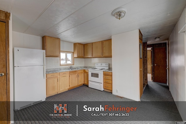 kitchen featuring sink, white appliances, dark colored carpet, and light brown cabinets