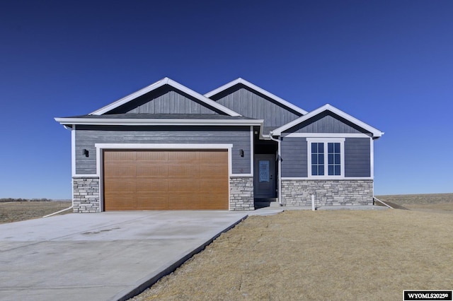 craftsman inspired home with a garage