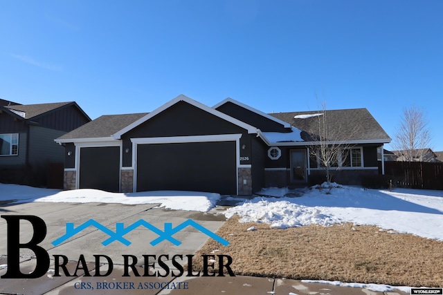 ranch-style house featuring a garage