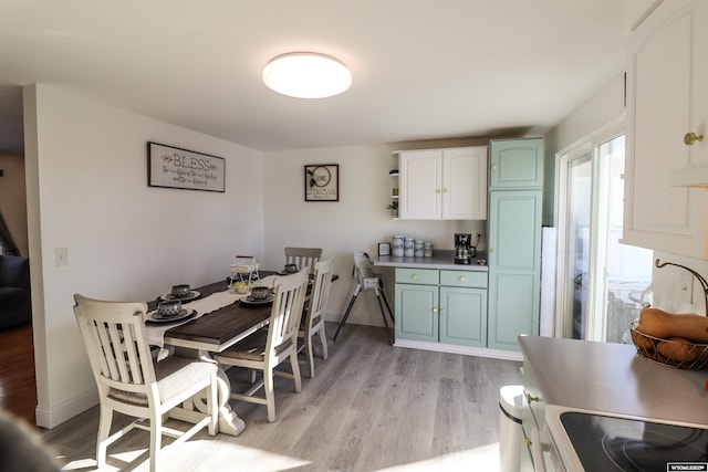 dining room featuring light hardwood / wood-style flooring