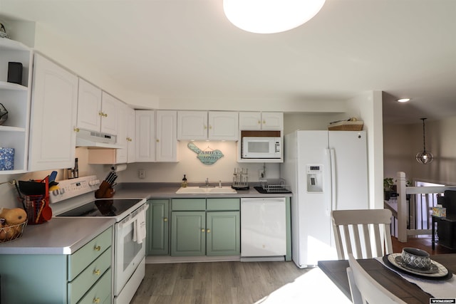 kitchen featuring sink, white cabinetry, green cabinets, white appliances, and light hardwood / wood-style floors