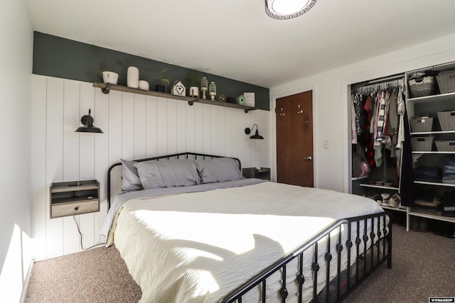 carpeted bedroom featuring a closet