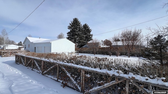 view of yard covered in snow