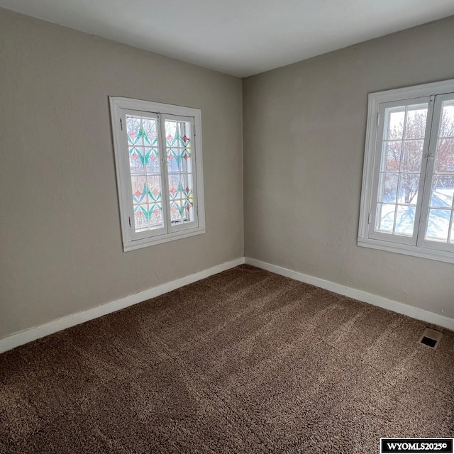 view of carpeted spare room