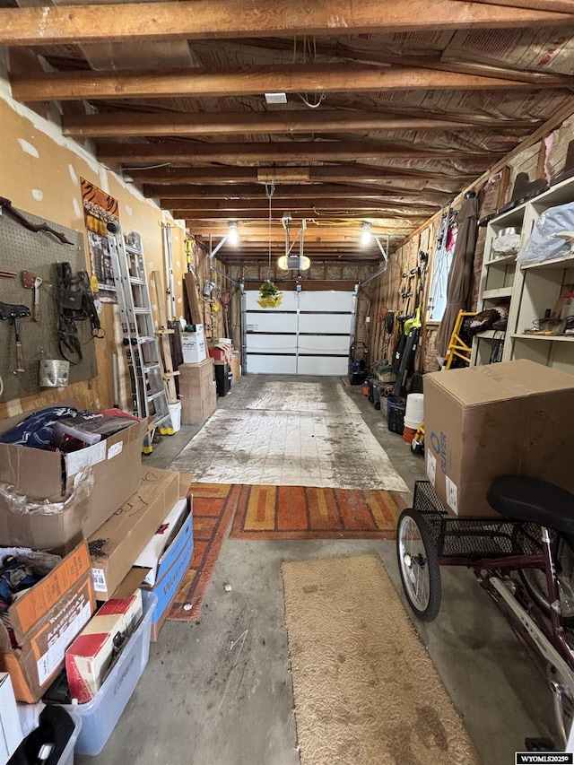 garage featuring a garage door opener