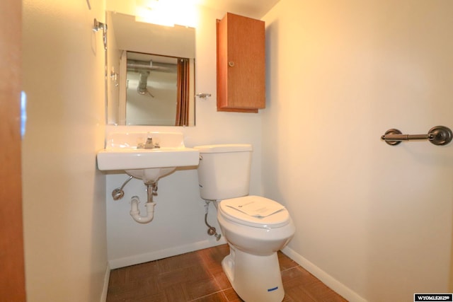 bathroom with sink and toilet