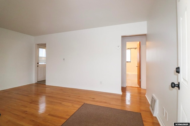 empty room featuring hardwood / wood-style floors