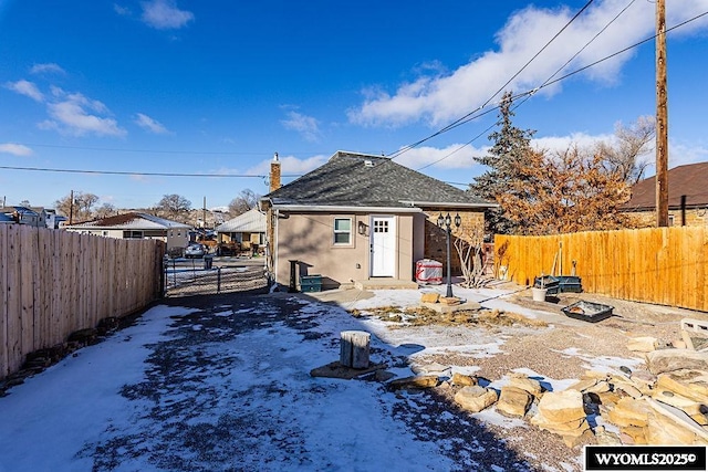 view of snow covered property