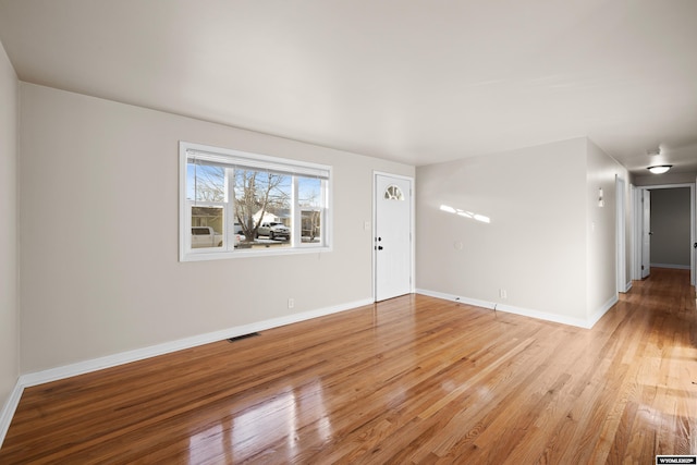 unfurnished room featuring light hardwood / wood-style flooring