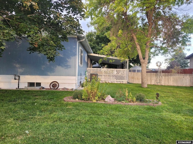 view of yard with a carport