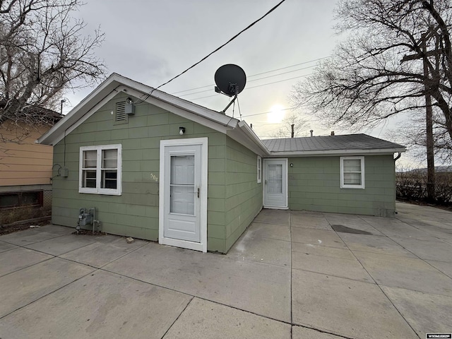 rear view of property featuring a patio area