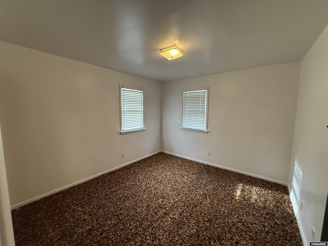 unfurnished room featuring carpet floors