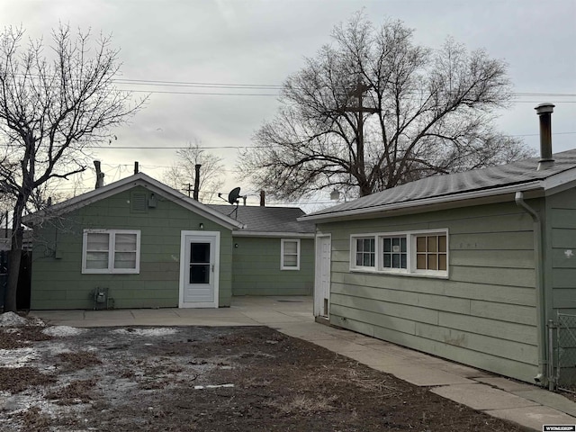 back of house with a patio area