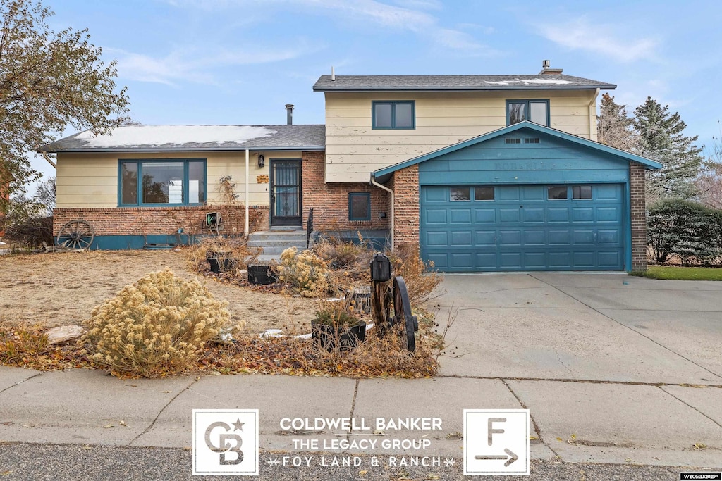 split level home with a garage