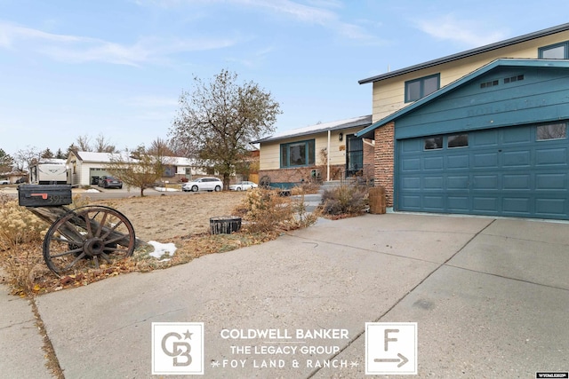 split level home featuring a garage