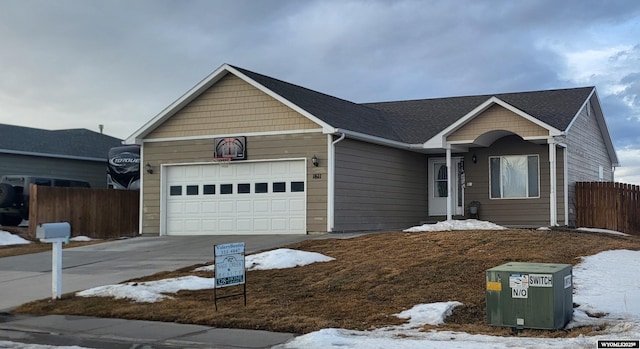 single story home with a garage