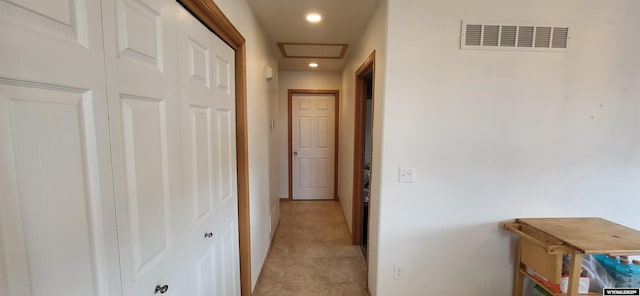 hallway with light tile patterned flooring