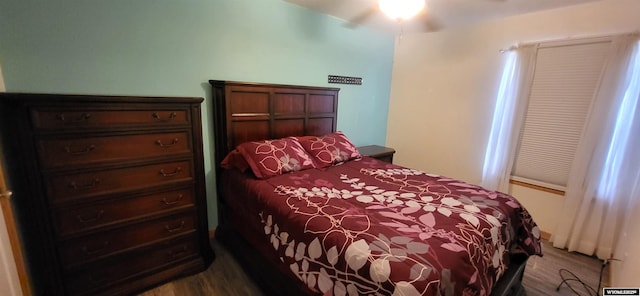 bedroom with wood-type flooring and ceiling fan